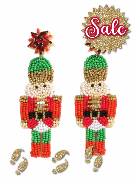 RED NUT CRACKER STATEMENT EARRINGS